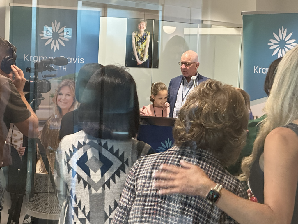 Man speaking in front of group