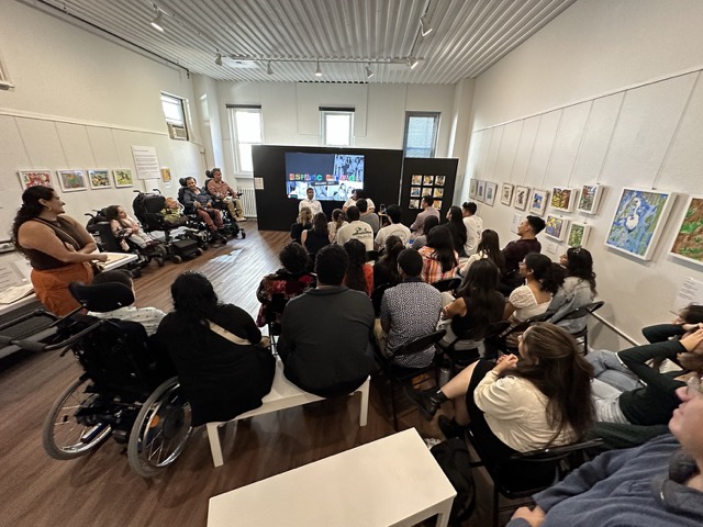 IMG_0519 Medium Large group in gallery watch tv monitor