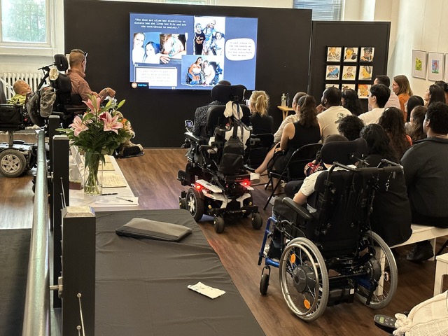 IMG_0495 Medium Large group in gallery watch tv monitor