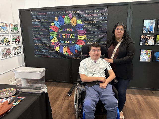 IMG_0482 Medium mom and son in wheelchair looking into the camera