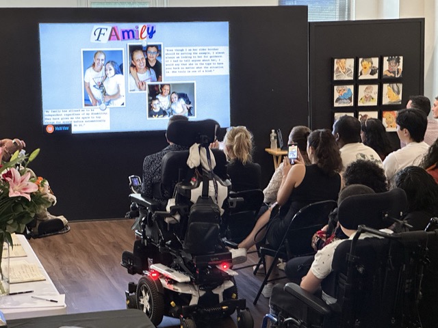 IMG_0486 Medium Large group in gallery watch tv monitor