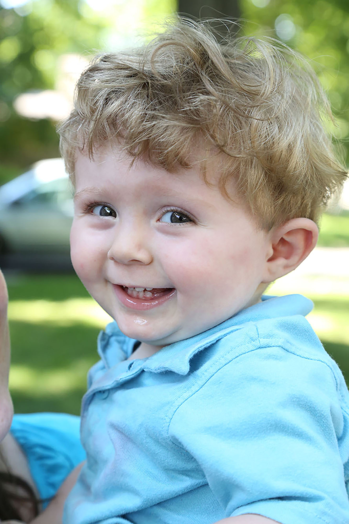 Young boy with sacral agenesis caudal regression smiles for close up picture