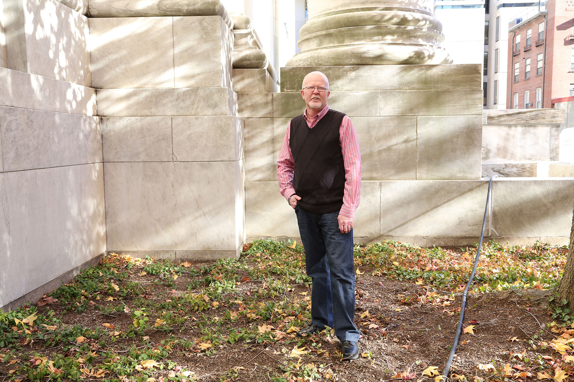 Older man with Hermansky-Pudlak syndrome standing and facing the camera