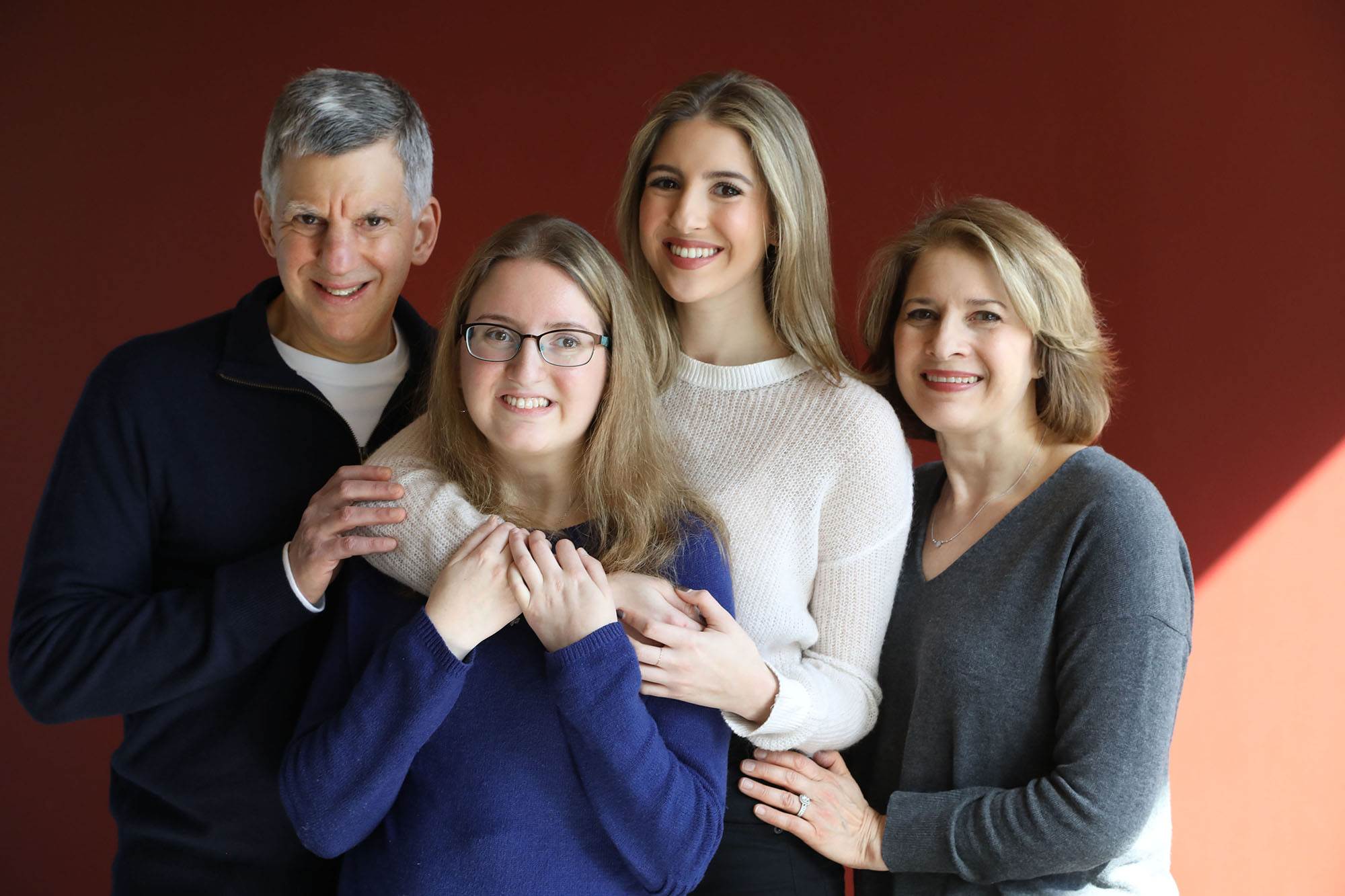 Woman with familial Dysautonomia posing with her family