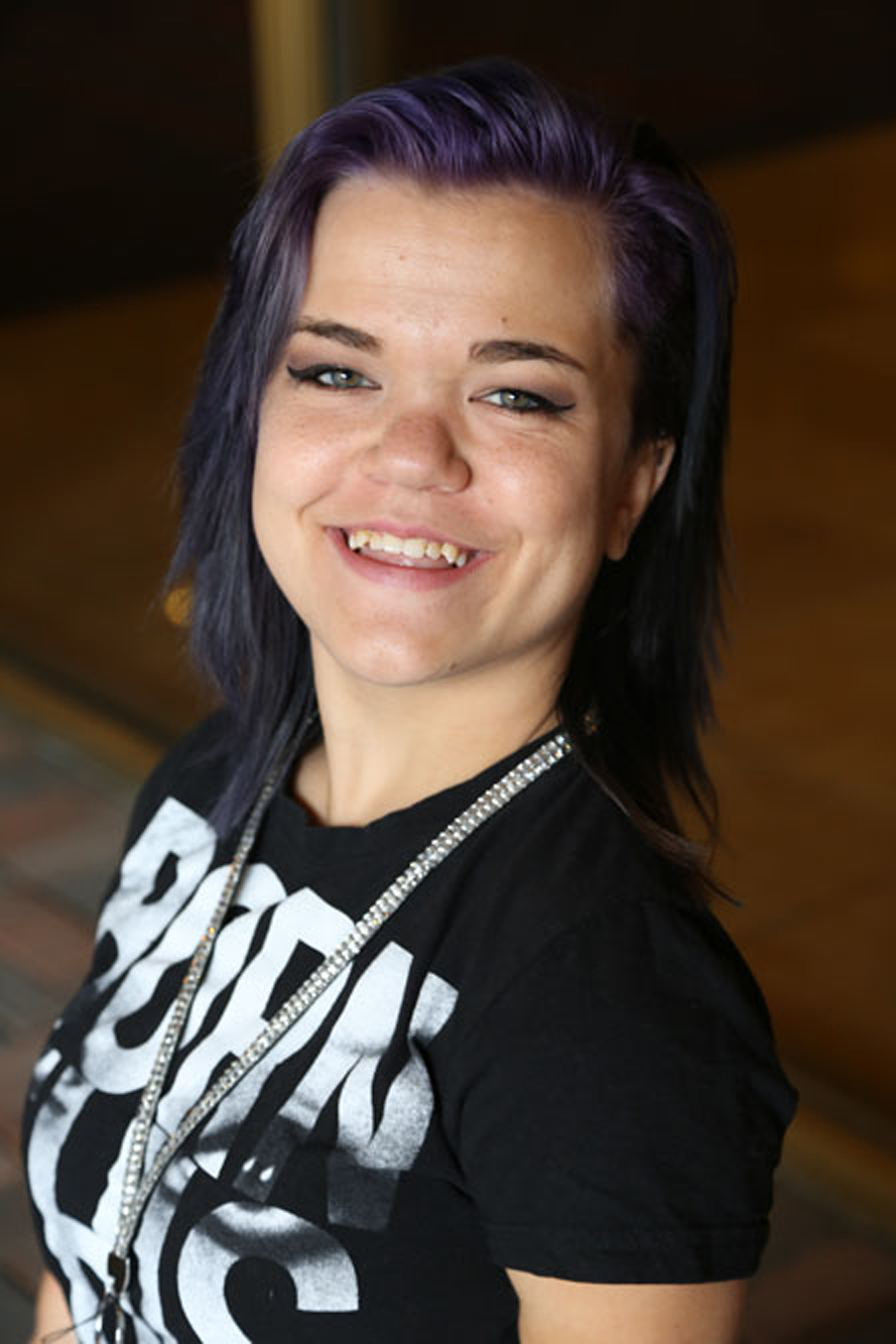 girl with skeletal dysplasia smiles at the camera