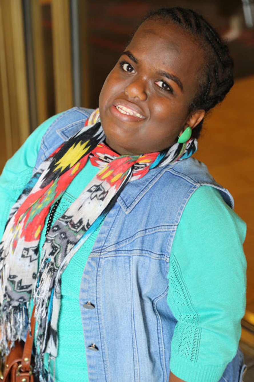woman with skeletal dysplasia wearing denim jacket