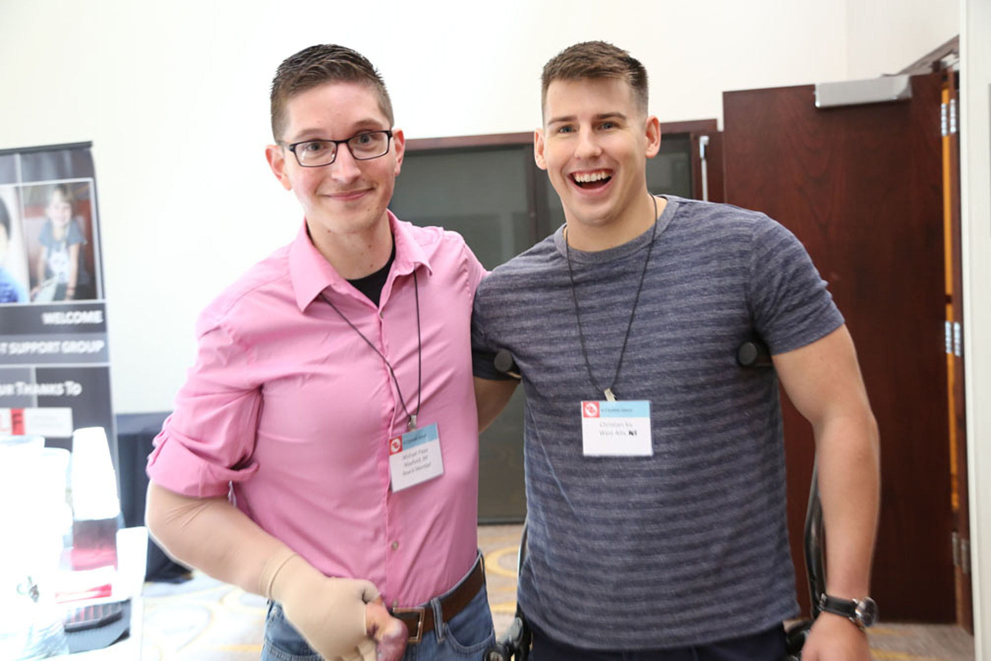 two men with klippel trenaunay syndrome smile in photo together
