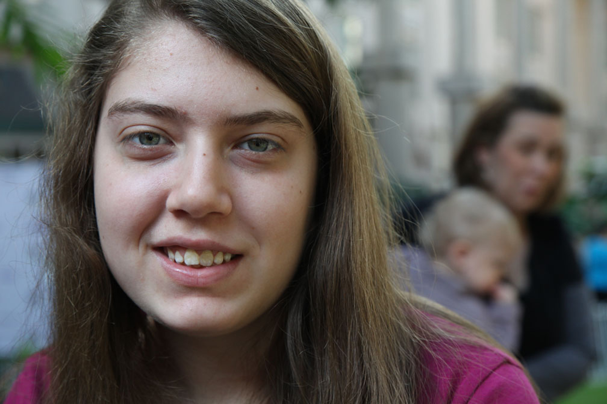 girl with dravet syndrome smiling at camera