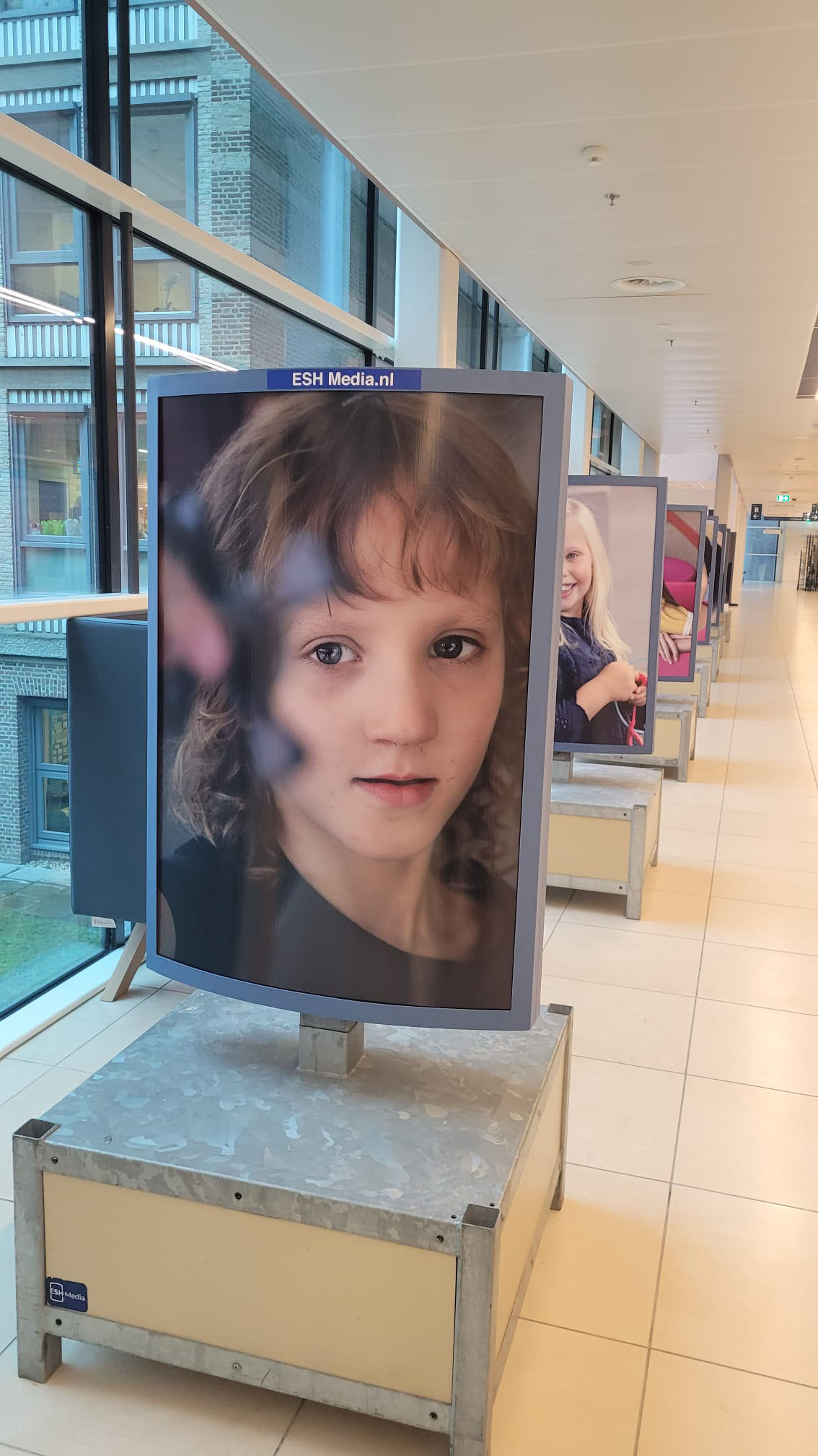 Image of a photo exhibition in a public space.