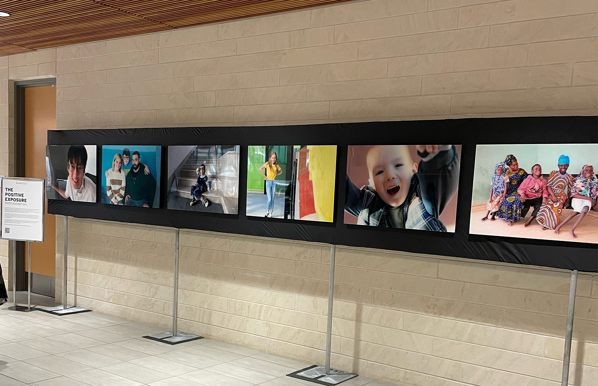 Images on public exhibition against black background.