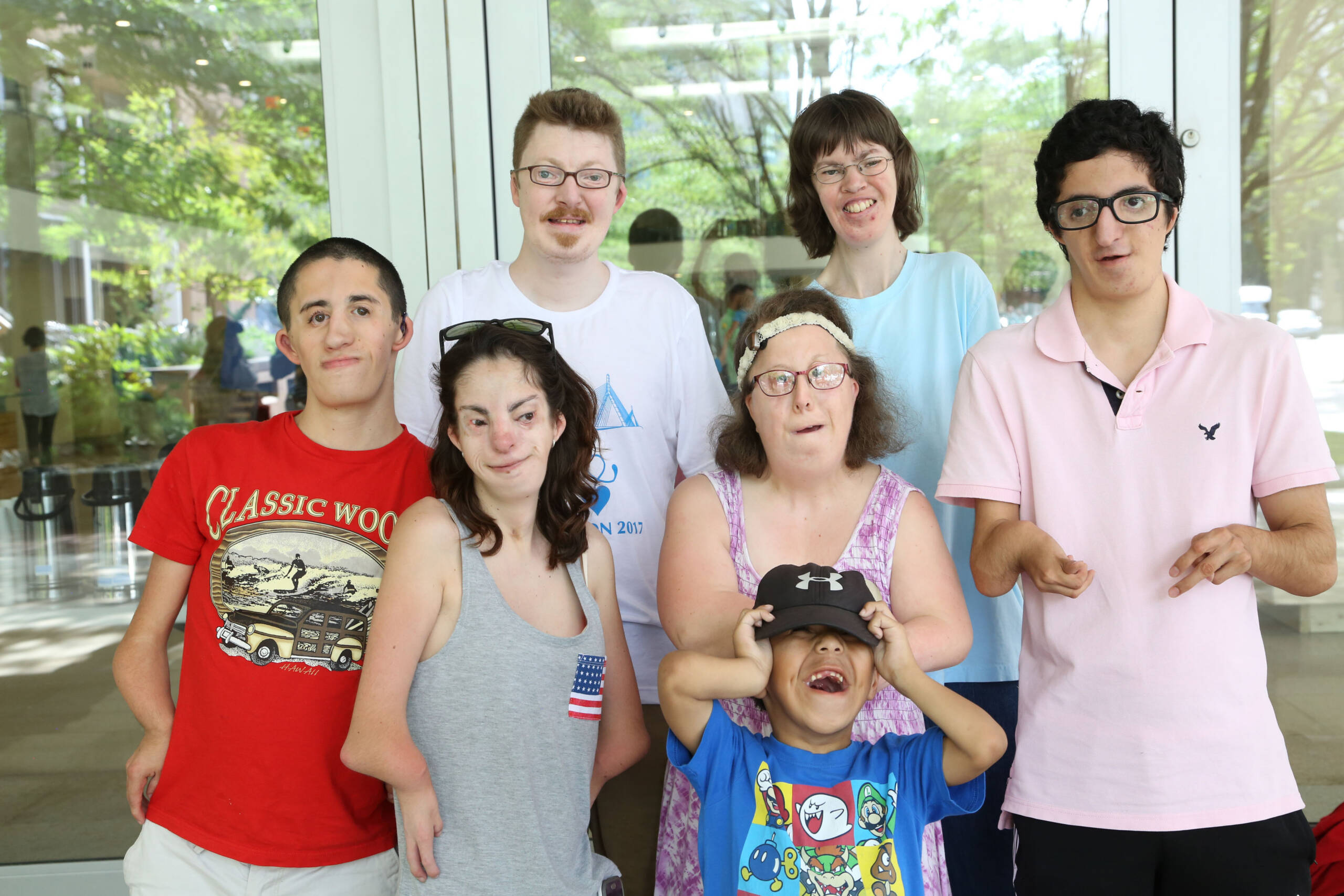 Group of several individuals posing for a group shot.